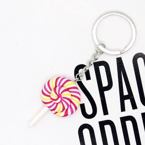 Colorful resin rainbow lollipop keychain with spiral swirl design and silver ring