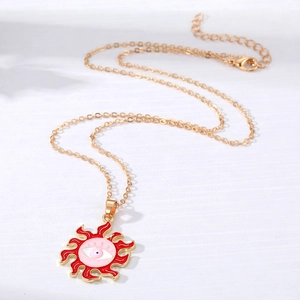 Bohemian gold sun flower pendant necklace with red enamel evil eye detail for women