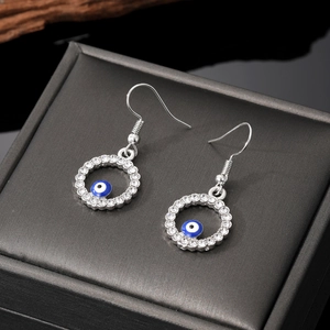Orecchini a cerchio Occhio di Allah in argento con strass su scatola nera