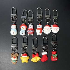 Set di 11 portachiavi natalizi colorati con ciondoli a forma di Babbo Natale, renna e pupazzo