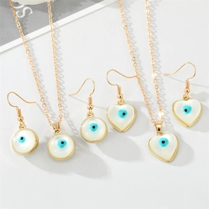 Detailed set of gold Evil Eye necklaces and earrings with white resin and blue heart charms