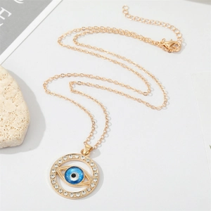 Collier vintage européen avec pendentif œil maléfique bleu et chaîne dorée pour femme