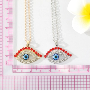 Vintage Turkish evil eye necklaces in gold and silver with red crystals and lashes