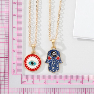 Vintage Turkish Evil Eye and Hamsa Hand pendant necklaces in gold finish with measurements