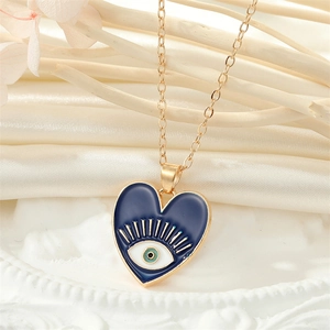 Collier vintage en forme de cœur mauvais œil avec émail bleu et chaîne dorée