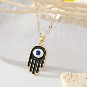 Collier Main de Fatima gothique avec pendentif œil sur chaîne dorée et pierres