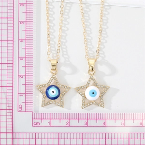 Colliers pendentifs Evil Eye en forme d'étoile avec cristaux scintillants dorés sur règle