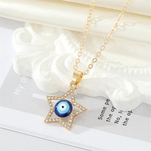 Collier doré en forme d'étoile avec pendentif œil bleu et strass scintillants
