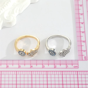 Adjustable Hamsa and Evil Eye open rings set with blue and white zircon stones