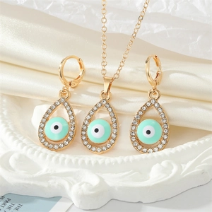 Conjunto de collar y pendientes de ojo turco dorado en forma de gota con circonitas