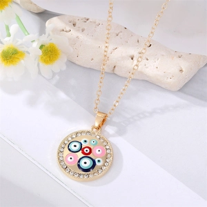 Gold Evil Eye pendant necklace with colorful enamel charms and sparkling rhinestones