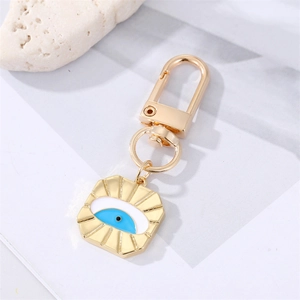 Golden Evil Eye heart keychain with blue enamel inlay and durable lobster clasp