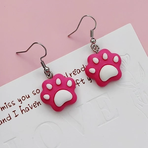 Cute pink resin cat paw drop earrings with silver metal hooks for fashion-forward women