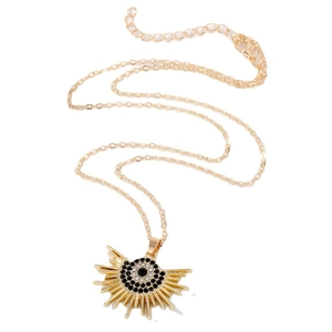 Collana dorata alla moda con ciondolo a occhio di sole e strass neri e bianchi brillanti