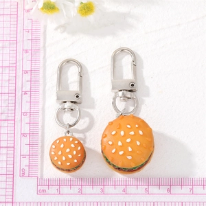Miniature burger keychain with realistic food design and durable silver metal ring clasp