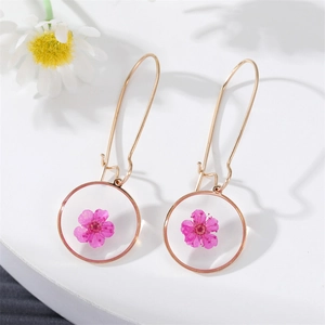 Minimalist gold round drop earrings with pink dried flowers in clear resin