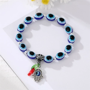 Ethnic Evil Eye beaded bracelet with silver Hamsa Hand pendant and colorful charms
