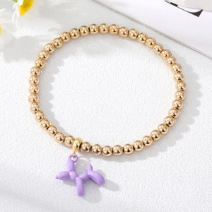 Fashionable gold beaded bracelet featuring a purple matte balloon dog pendant for women