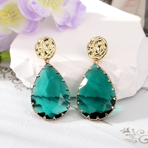 Elegant emerald green crystal teardrop earrings with gold textured metal accents