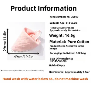 Detail view of pink cotton baby bandana bib with soft white pom-pom trim and size specs