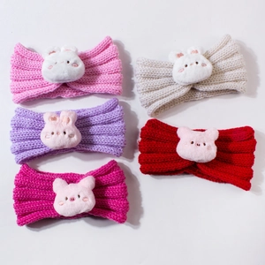 Five assorted knitted baby headbands featuring cute plush animal heads in soft pastel colors