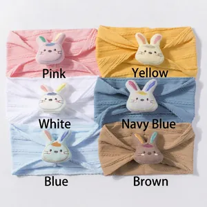 Detail of soft knitted baby headbands with cute 3D stuffed rabbit dolls in six colors