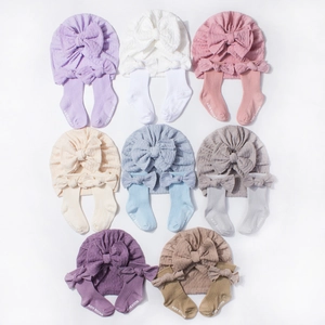 Infant jacquard bow headband and ribbed socks set in eight different solid colors