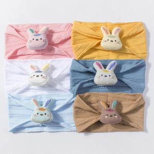 Set of 6 soft elastic baby headbands with cute plush bunny decor in assorted colors