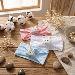 Three-pack elastic infant headbands with cute 3D embroidered bunny heads in pastel colors