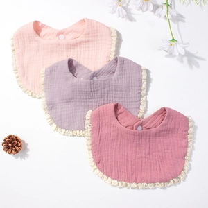 Three-piece baby cotton gauze bib set with elegant lace trim and secure snap buttons