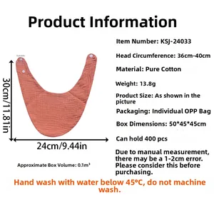 Detail view of 100% cotton gauze baby bib in coral orange with adjustable snap buttons