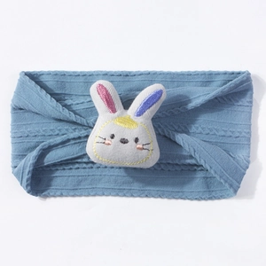 Detail of grey-blue knit baby headband with a cute 3D stuffed bunny and ribbed texture