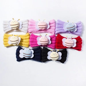 Eight-piece set of knitted baby headbands with cute plush bees in assorted colors