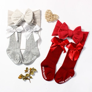 Baby bow headband and socks set in red and grey colors with cable knit texture