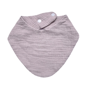 Detailed texture of gray-purple cotton muslin baby bib with adjustable double snaps
