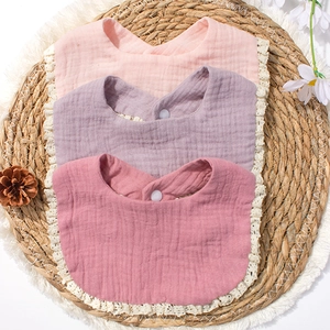 Set of 3 cotton gauze baby bibs with lace trim and snap buttons in pastel pink and purple
