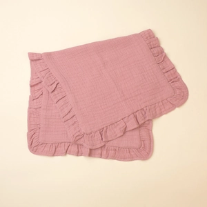Detail view of the pink ruffled muslin cotton burp cloth with soft crinkle texture