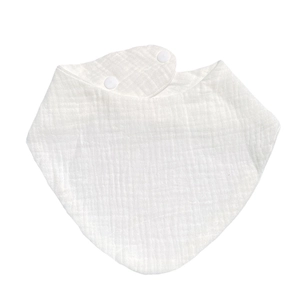 Detailed view of white cotton gauze baby bib with breathable texture and snap buttons