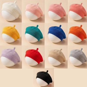 Solid color knitted beret hats for babies and infants in thirteen various colors
