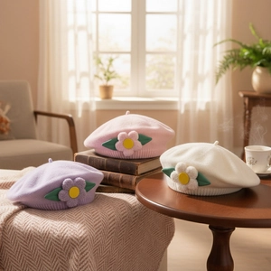 Soft knitted baby beret hat with 3D floral accent in pink, purple and beige colors