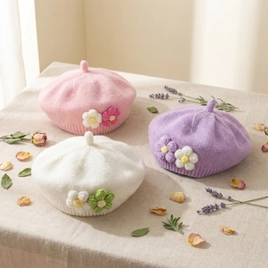 Knit baby flower berets in pink, white, and purple for girls' spring and autumn style
