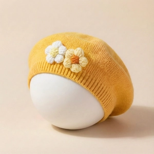 Ginger yellow knitted beret for girls featuring two handcrafted flower decorations