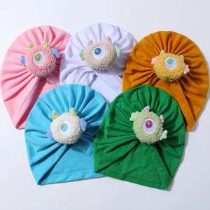Cinque cappelli a turbante colorati per neonati con simpatici mostri di peluche