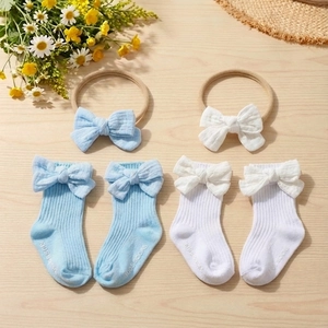 Cotton baby bow headband and non-slip socks set in light blue and white colors