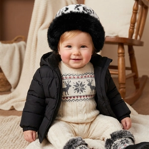 Cozy winter baby outfit featuring leopard print plush hat and deer pattern knit sweater
