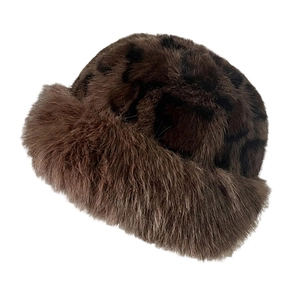 Detailed view of the soft leopard print faux fur texture on this winter bucket hat for kids