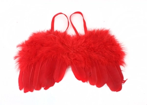 Detailed view of red feather angel wings with elastic straps for kids photo props