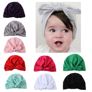 Detailed grid view showing various colors of soft rabbit ear knot baby turban hats