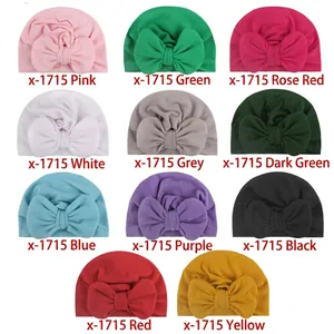 Detailed grid of soft baby hats featuring large butterfly knots in eleven vibrant colors