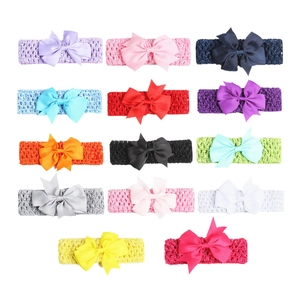 14-piece set of baby headbands with large ribbed bows and crochet hollow design